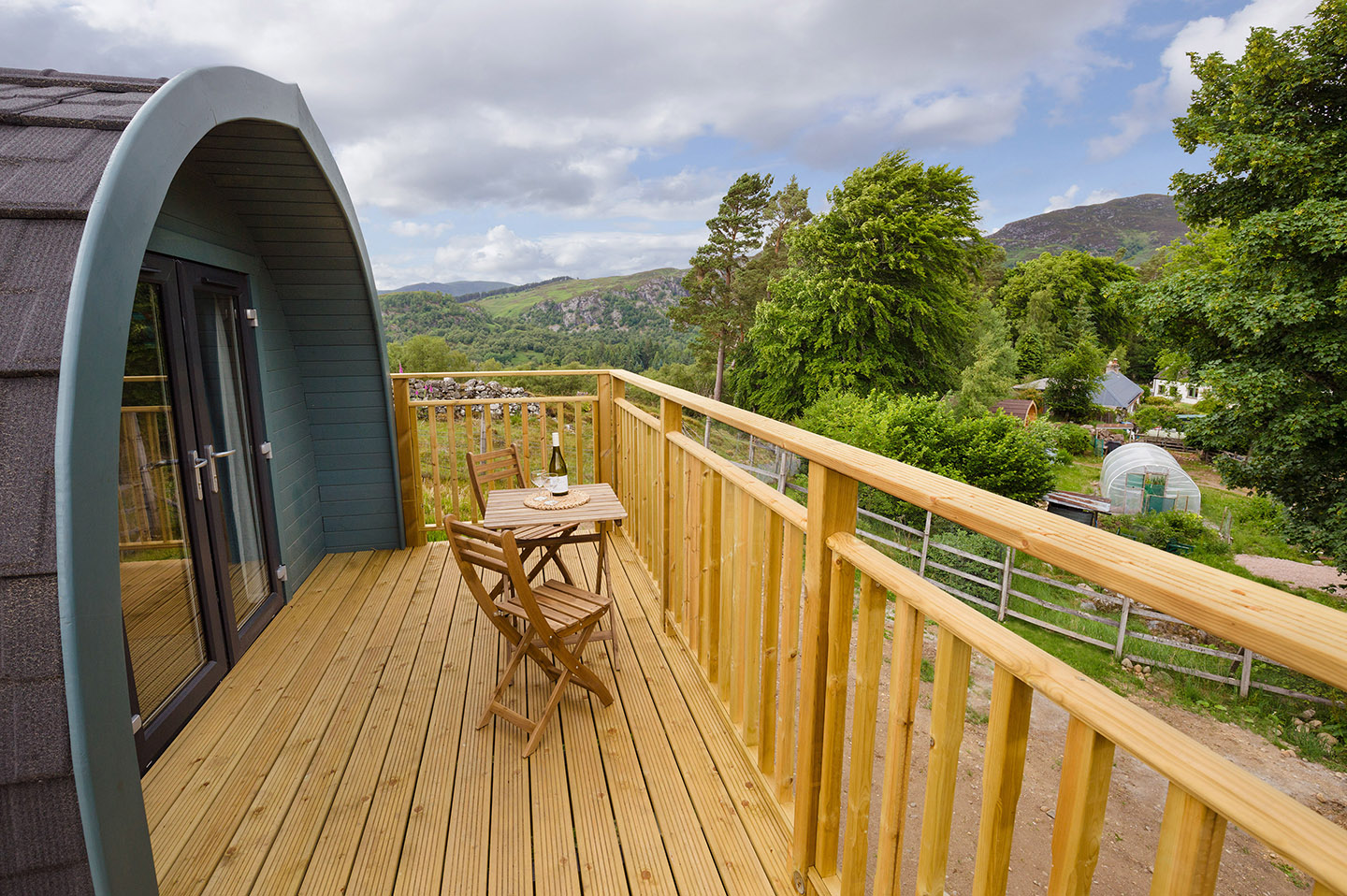 Scenic balcony view from upper pod overlooking nature