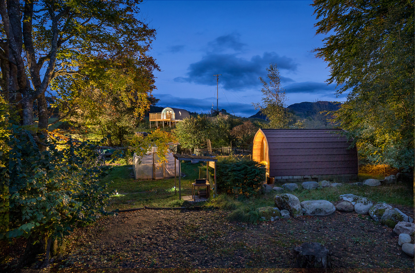 Nighttime view of both upper and lower pods illuminated